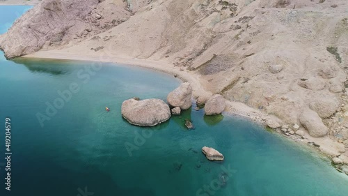 Metajna, island of Pag. Famous Beritnica beach in stone desert amazing scenery aerial view photo