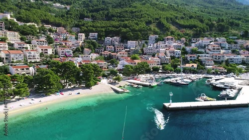 Aerial view of Brela beach and waterfront on Makarska riviera, Dalmatia region of Croatia photo