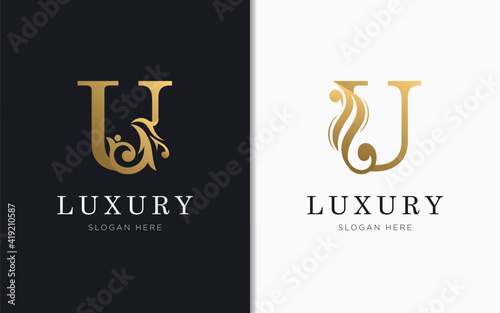 Luxury letter U with gold color logo template