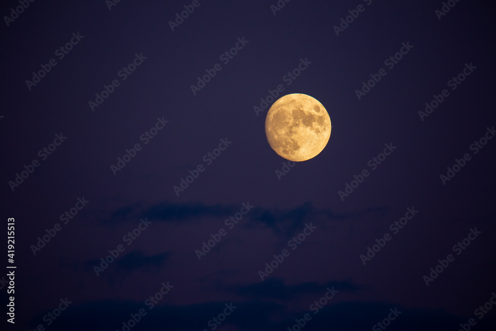 Fototapeta premium Glowing Moon Against Night Sky