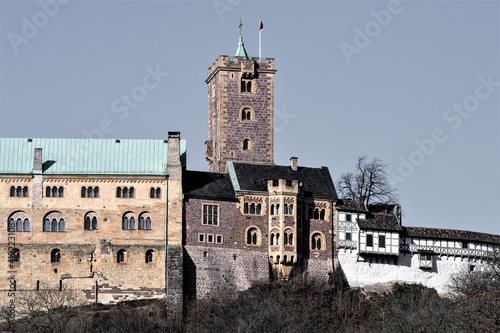 Der Bergfried und das Hauptgebäude der Wartburg bei Eisenach - 1067  gegründet, Weltkulturerbe und in Verbindung Mit Luther, der heiligen Elisabeth, Goethe und Wagner Sinnbild deutscher Geschichte photo