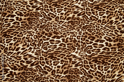 Leopard effect fabric pattern background sample. Leopard print seamless background.