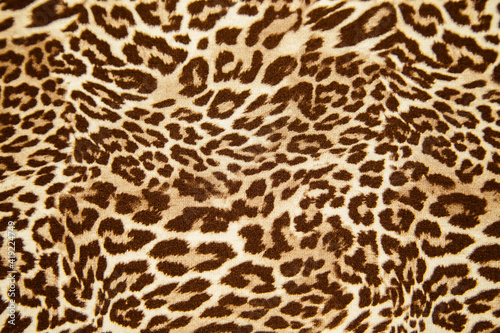 Leopard background texture safari pattern leopard print fabric material design.