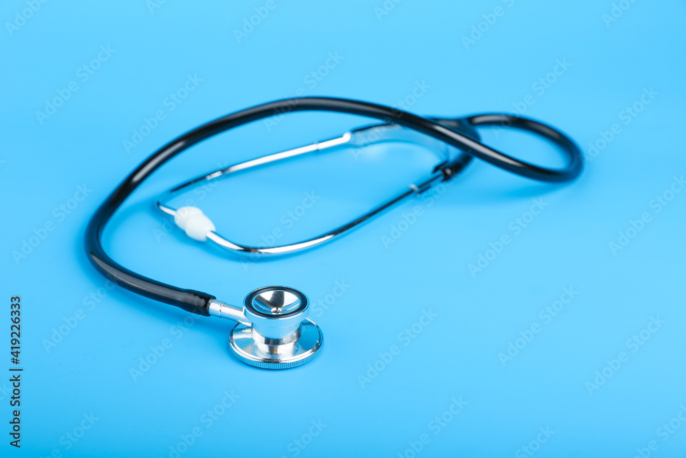 stethoscope on blue background with copy space stethoscope on blue background with copy space