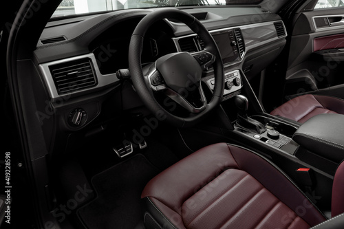 Luxury car Interior - steering wheel, shift lever, dashboard and touch screen