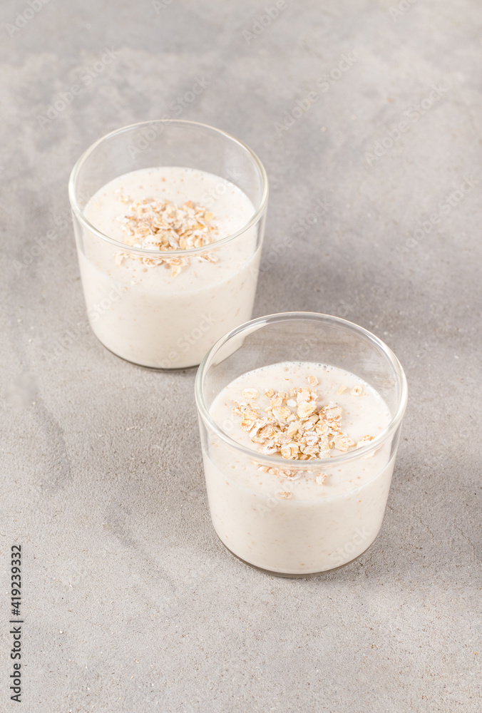 Dessert multigrain jelly in a glass on a light gray background Dessert multigrain jelly in a glass on a light gray background