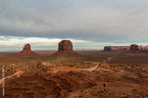 dramatic landscape photo of the spectacular mesa and buttes and rock formations in Monument Valley in the border of Utah and Arizona. © Nathaniel Gonzales