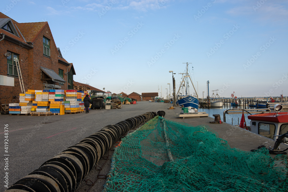 Traditional fishing port with laid out fishing net.