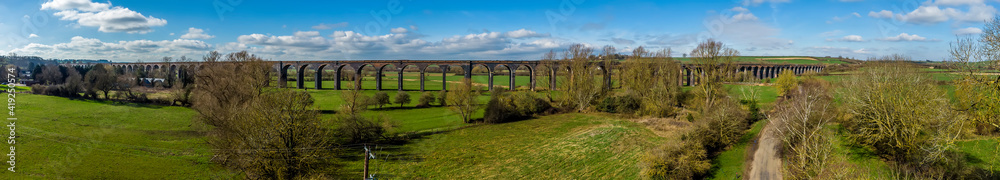 A panorama view across the Harringworth railway viaduct, the longest masonary viaduct in the UK A panorama view across the Harringworth railway viaduct, the longest masonary viaduct in the UK