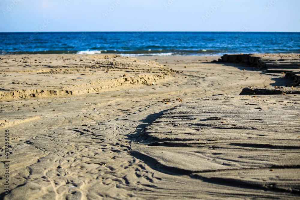Textures on the beach sand after the storm Textures on the beach sand after the storm