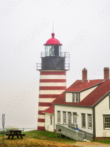 USA, Maine. West Quoddy Head Light at Quoddy Head State Park in Lubec, Maine. Easternmost point in the United States. photo