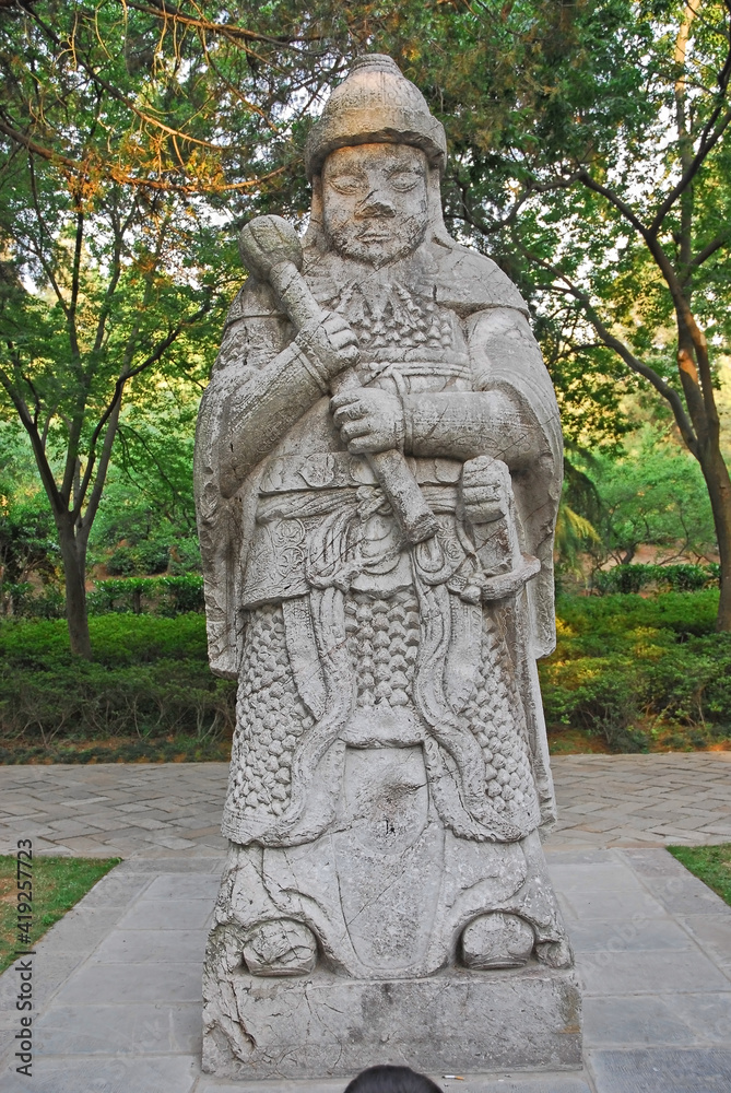 China, Nanjing, military official statue on the Spirit Way  to Xiao ling Mausoleum. The place has harmony and serenity atmosphere.