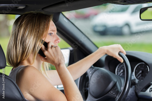 female driver talking on the phone © auremar