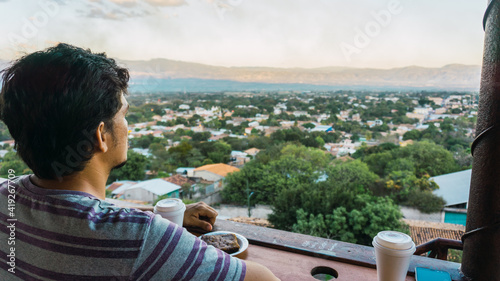Man enjoying a pretty sunset in Honduras Central America