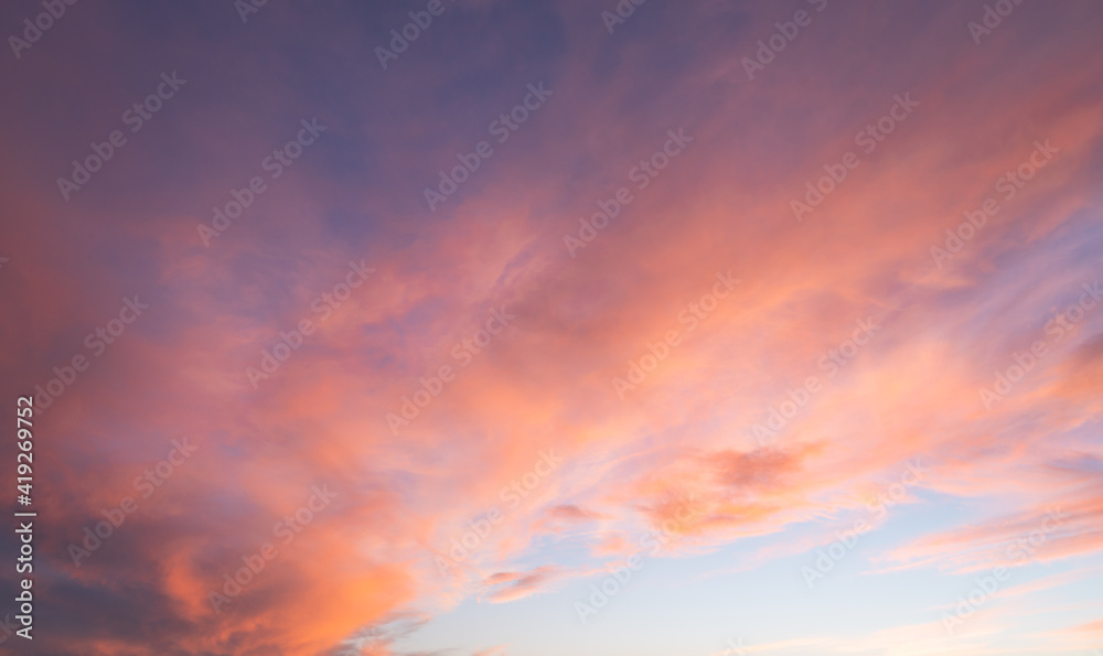 cloudy sky in a very colorful sunset with red clouds