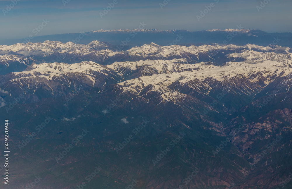 Aerial view of snow covered Tian Shan mountains in Kyrgyzstan