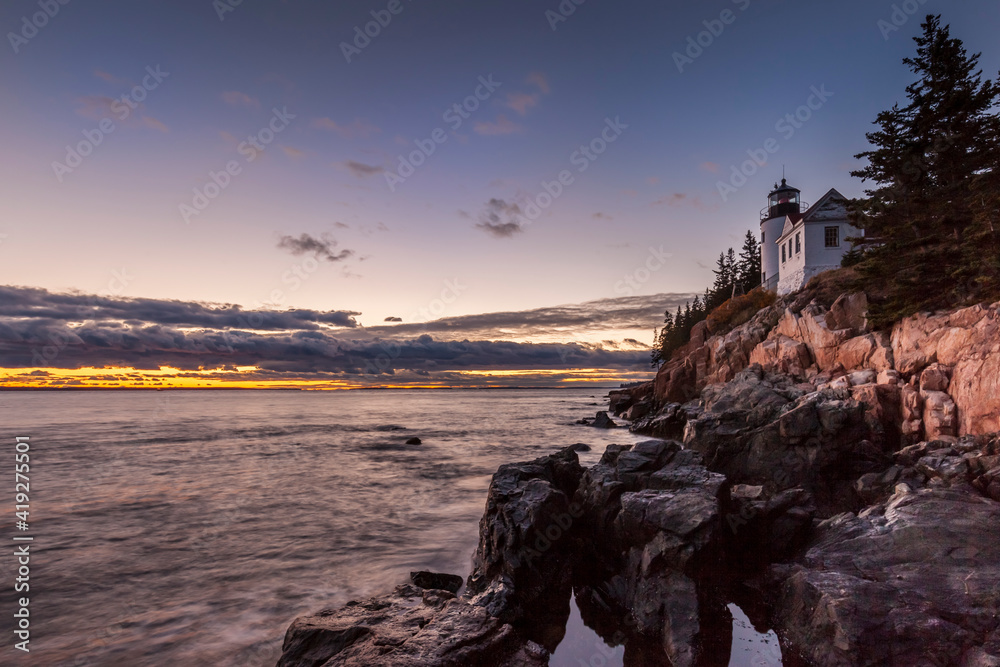 USA, Maine, Mt. Desert Island. Acadia National Park, Bass Harbor Head Lighthouse at dusk.