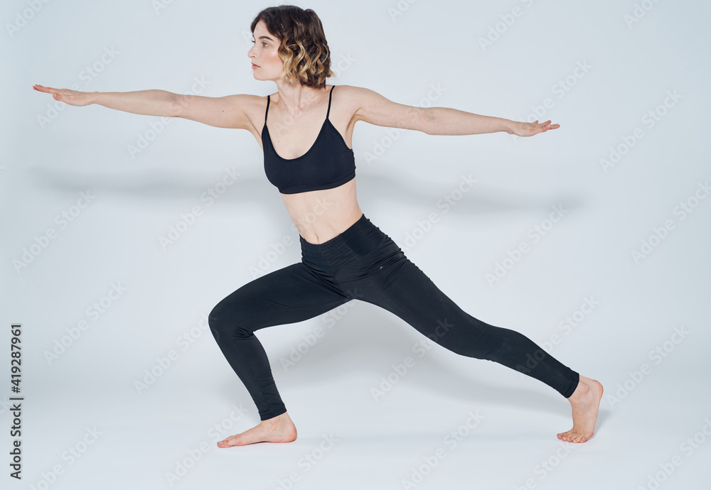 Obraz premium Exercises slim woman yoga asana light background meditation model