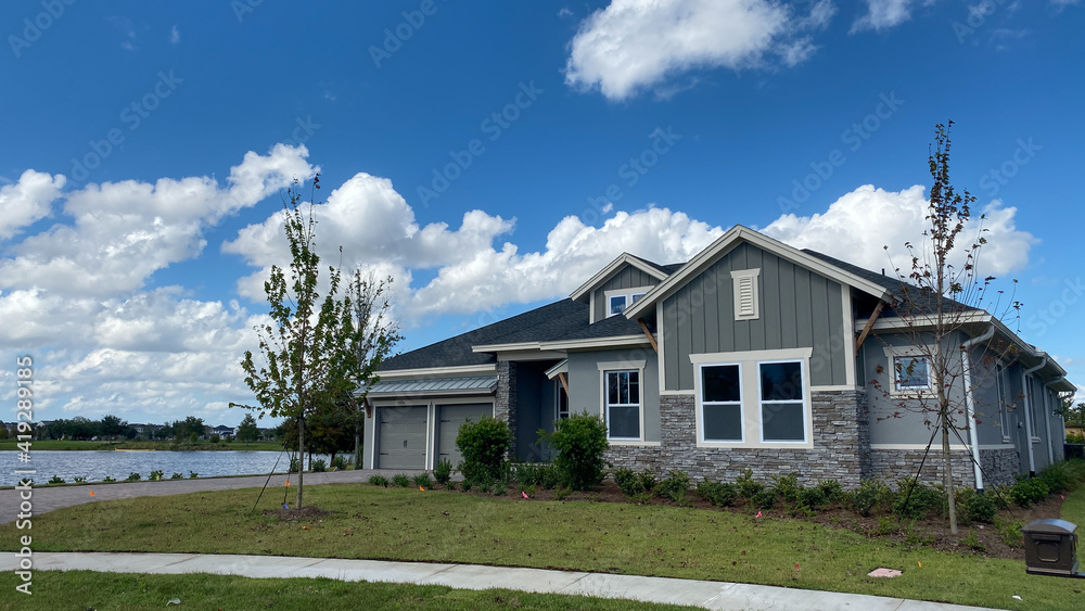 A luxury gray house in the Laureate Park neighborhood