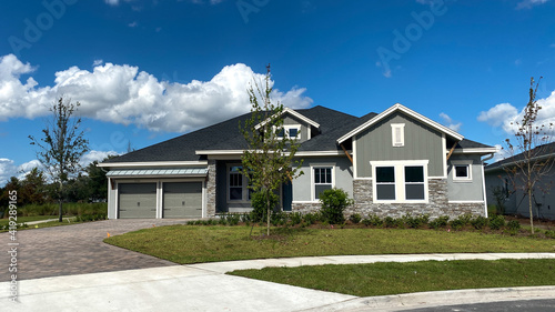 A luxury gray house in the Laureate Park neighborhood