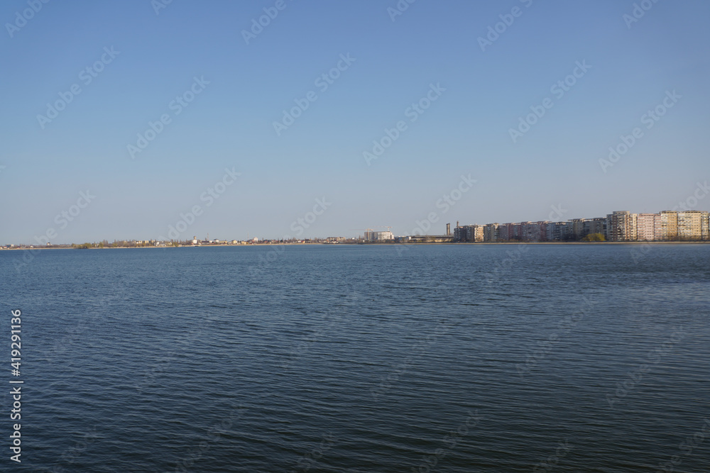 Lake Morii with blocks in the background, Bucharest, Romania.