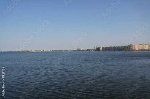 Lake Morii with blocks in the background, Bucharest, Romania. © samy