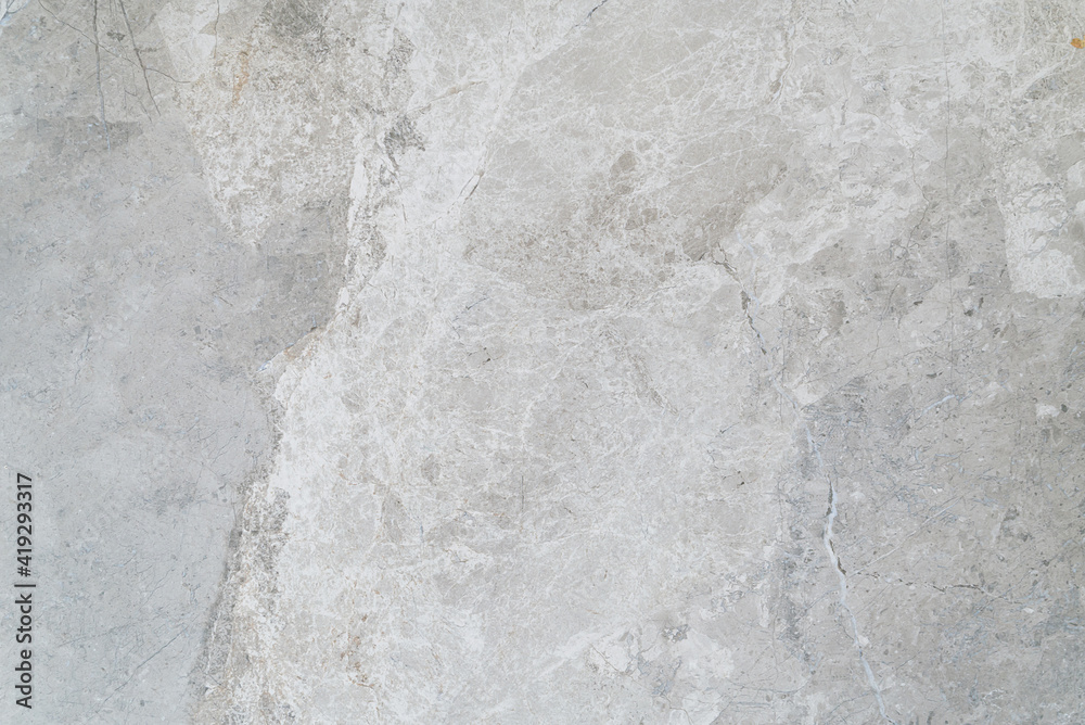 the texture of a gray marble slab made of natural stone. marble surface background the texture of a gray marble slab made of natural stone. marble surface background