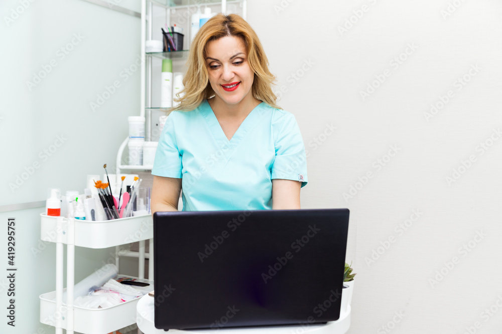 medicine, technology and healthcare concept - female doctor or nurse with computer talking with patient