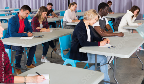 Multinational group of different age students at extension courses