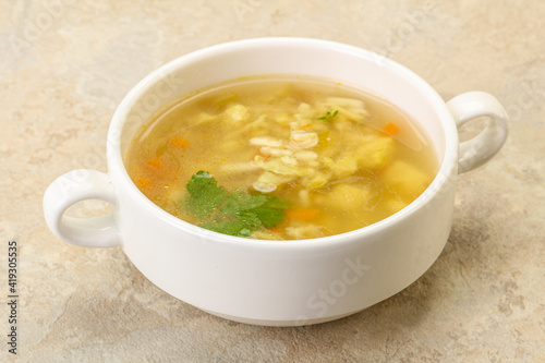 Tasty chicken soup with carrot