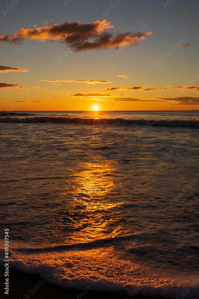 A beautiful sunrise from the shore of the beach