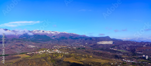 Panorama of the mountain range in early spring in Europe
