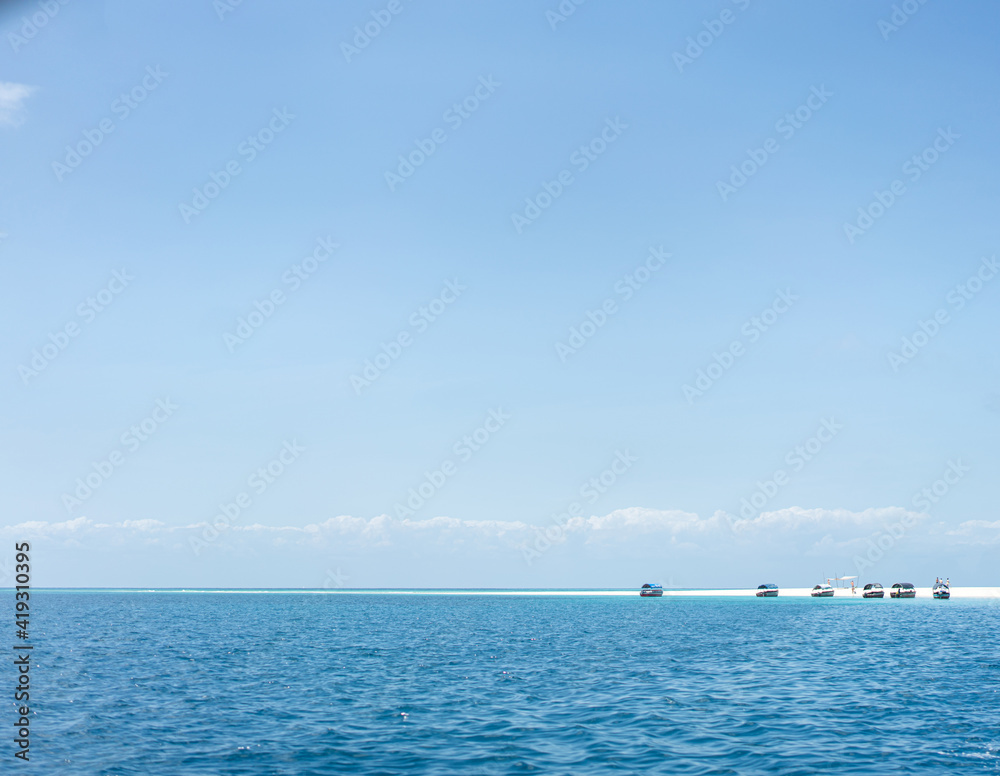 Nice far cast away tropical island on sunny day Nice far cast away tropical island on sunny day