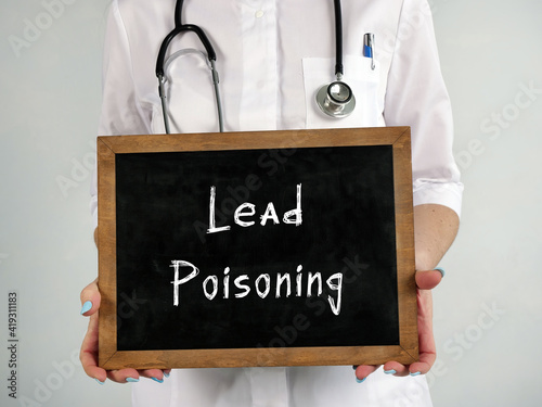 Photography Healthcare concept meaning Lead Poisoning with sign on the sheet.