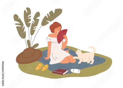 Exhausted woman resting in nature and fanning herself in hot summer. Person w...