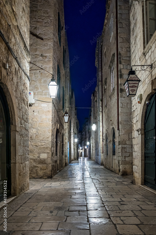 Old City of Dubrovnik. Narrow street of medieval town at night, Dalmatia Croatia