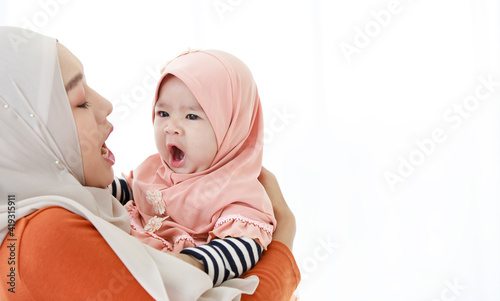 Photography Beautiful muslim mother holding her baby