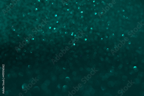 Abstract sparkling bokeh background. Top horizontal view copyspace. © Elina
