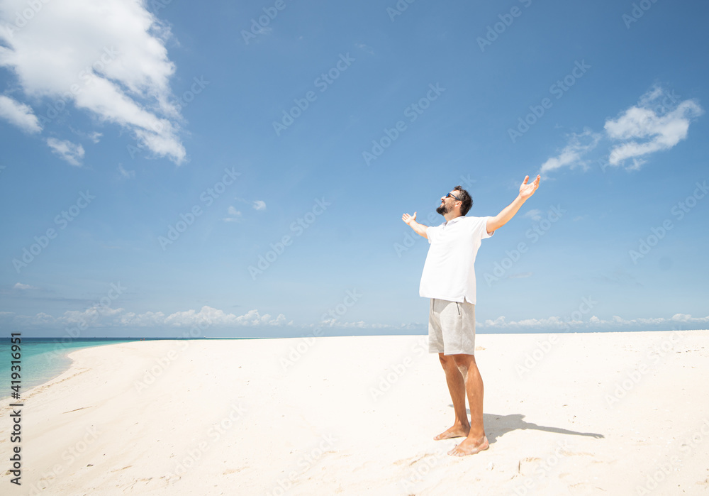 One man is enjoying beautiful tropical beach One man is enjoying beautiful tropical beach