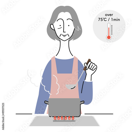 食中毒予防のために加熱調理をするシニア女性