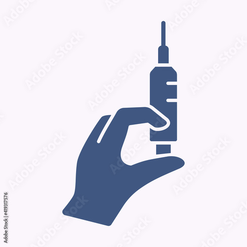 Hand holding syringe glyph icon on white background. Vector illustration.