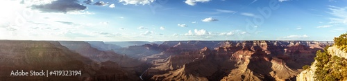 Mountains, hills and canyons of Grand canyon national park in mornign haze and sunshine, america