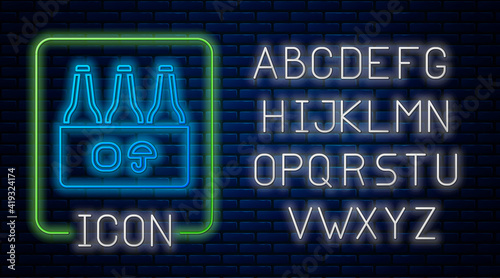 Glowing neon Pack of beer bottles icon isolated on brick wall background. Case crate beer box sign. Neon light alphabet. Vector.