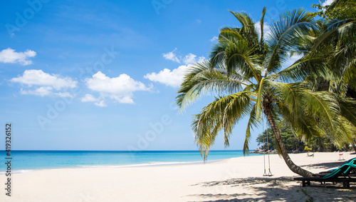 Beautiful tropical beach banner with coco palm tree as swing for relax lifestyle of white sand background, Travel summer concept