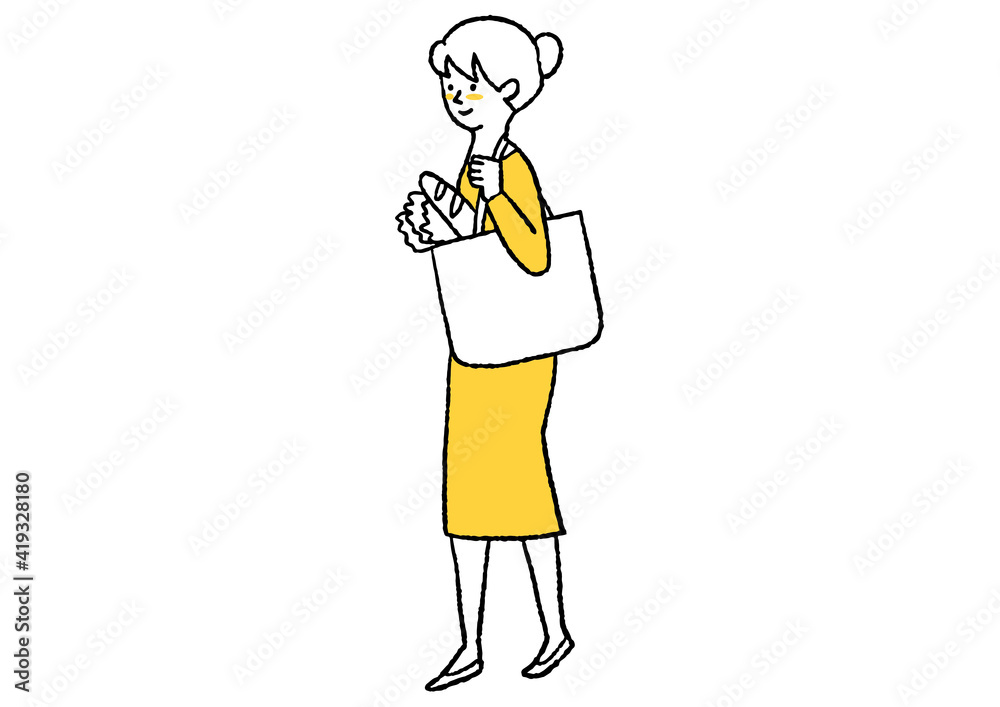 買い物袋を肩からさげている女性 買い物袋を肩からさげている女性