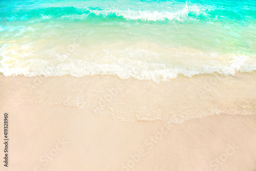 wave sea beautiful asian beach with white sand and blue sky, mountain. Seascape