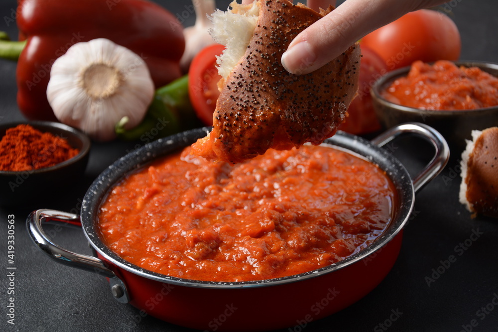 Matbucha - Moroccan Tomato dip, spread or condiment - Cooked Spicy Tomatoes, Peppers, Garlic and Chili Pepper Matbucha - Moroccan Tomato dip, spread or condiment - Cooked Spicy Tomatoes, Peppers, Garlic and Chili Pepper
