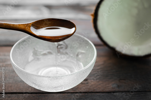Valokuva Cold pressed coconut oil wooden spoon