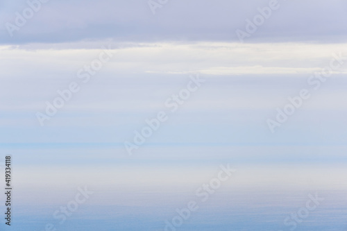 natural background, morning seascape in the gentle dawn mist
