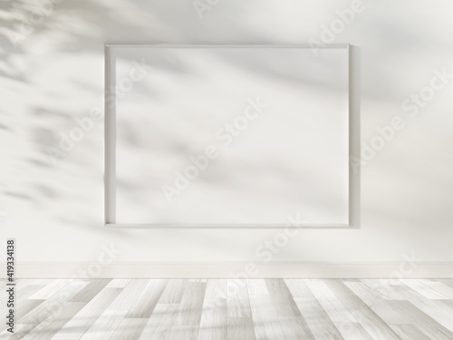 Fototapeta Naklejka Na Ścianę i Meble -  White frame hanging in bright interior mockup. Template of a picture framed on a wall 3D rendering